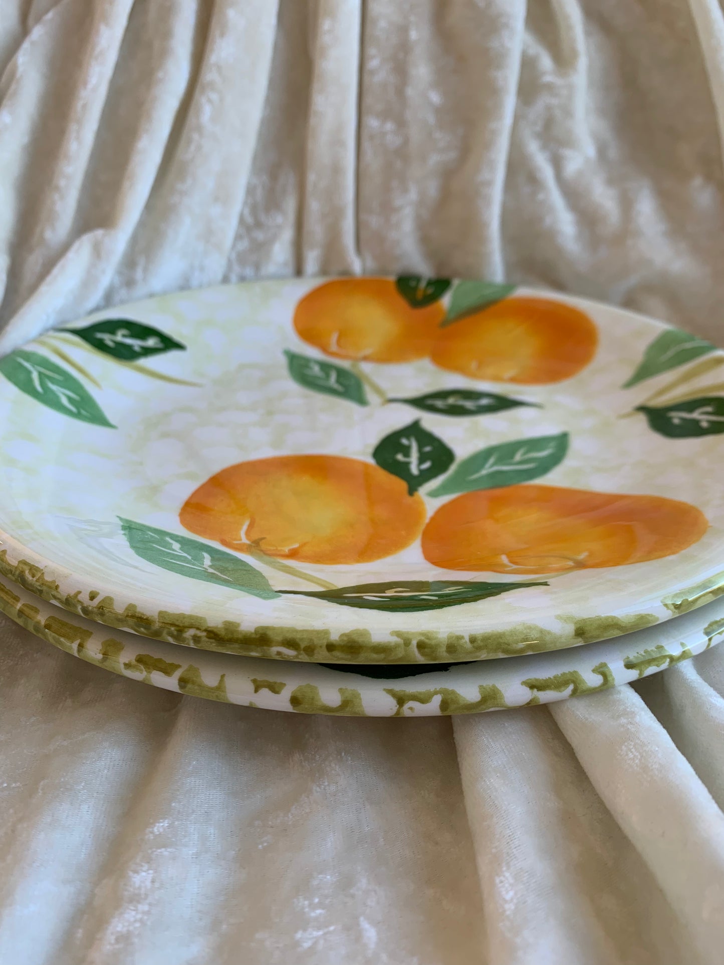 Deux assiettes plates motifs oranges Made in Italy