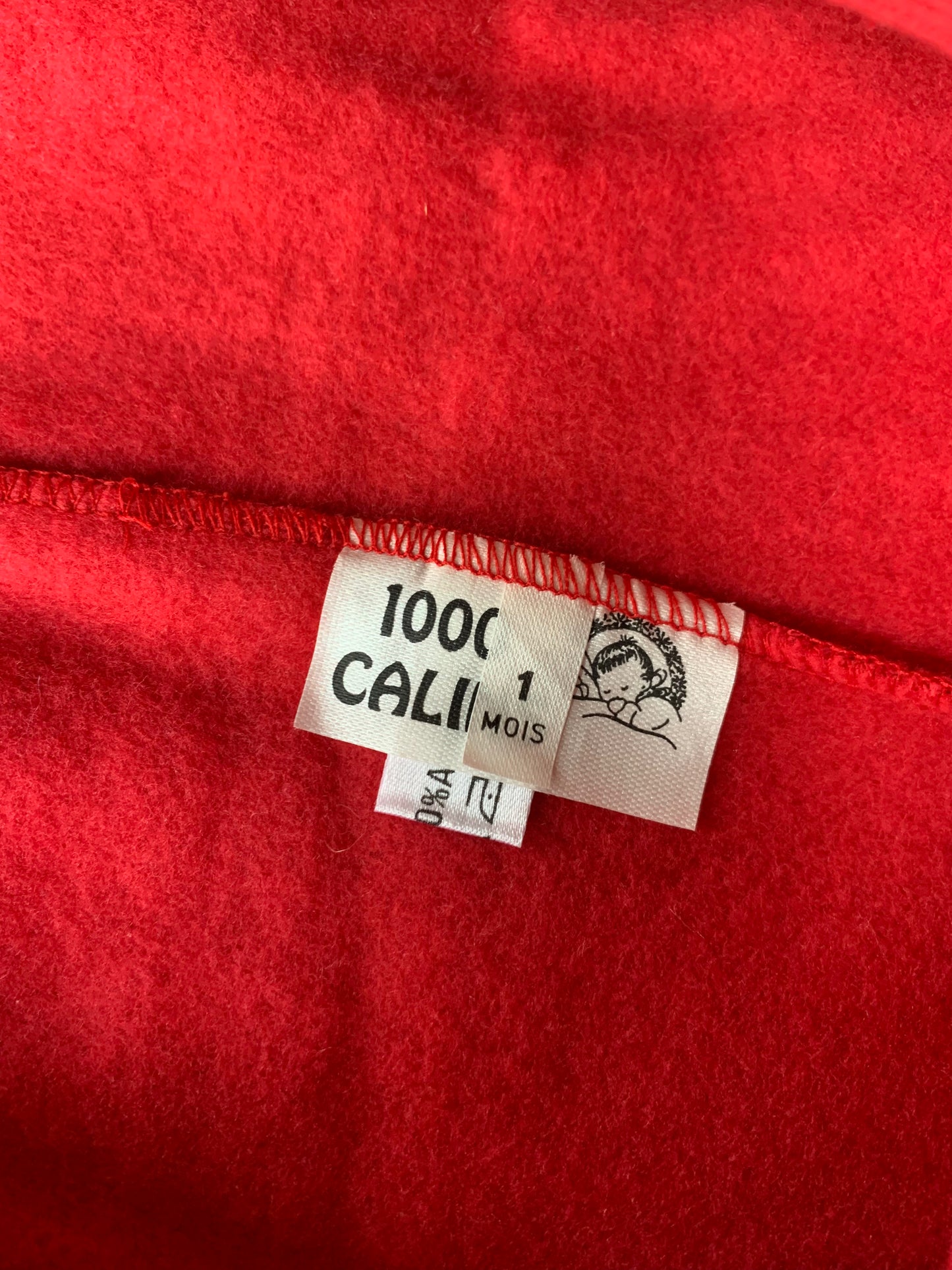 Combinaison rouge avec petits noeud 1000 câlins T.1 mois