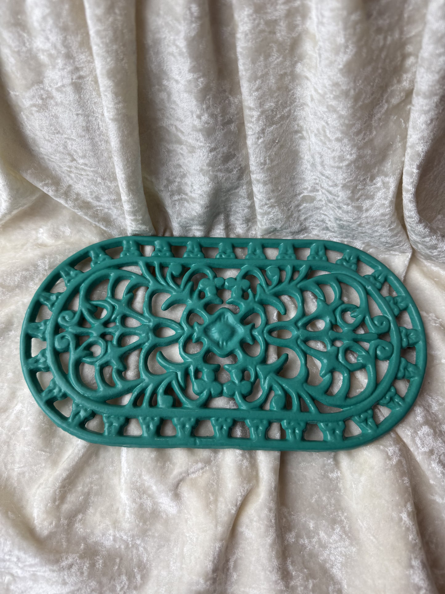 Dessous de plat turquoise en fonte