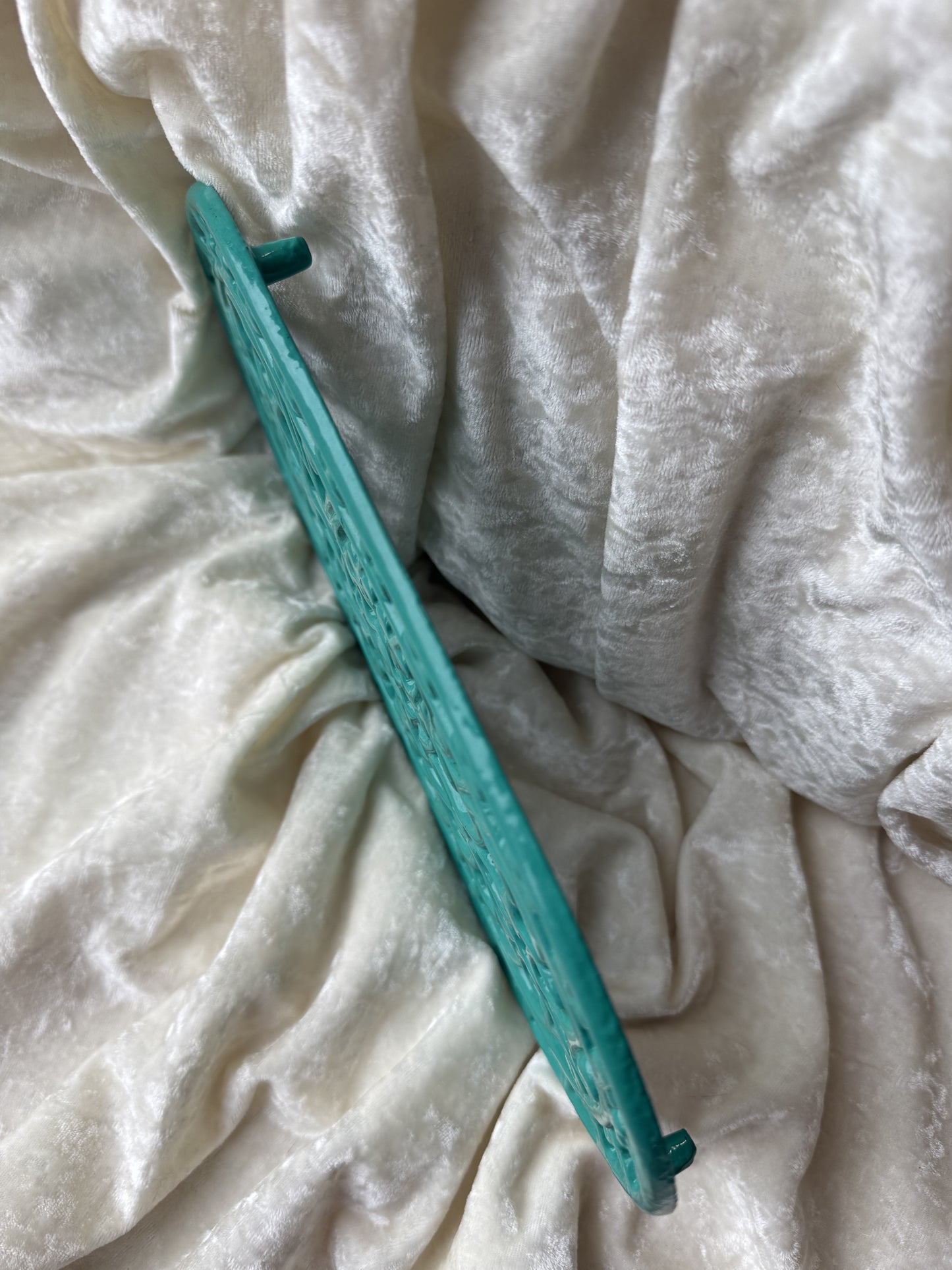 Dessous de plat turquoise en fonte