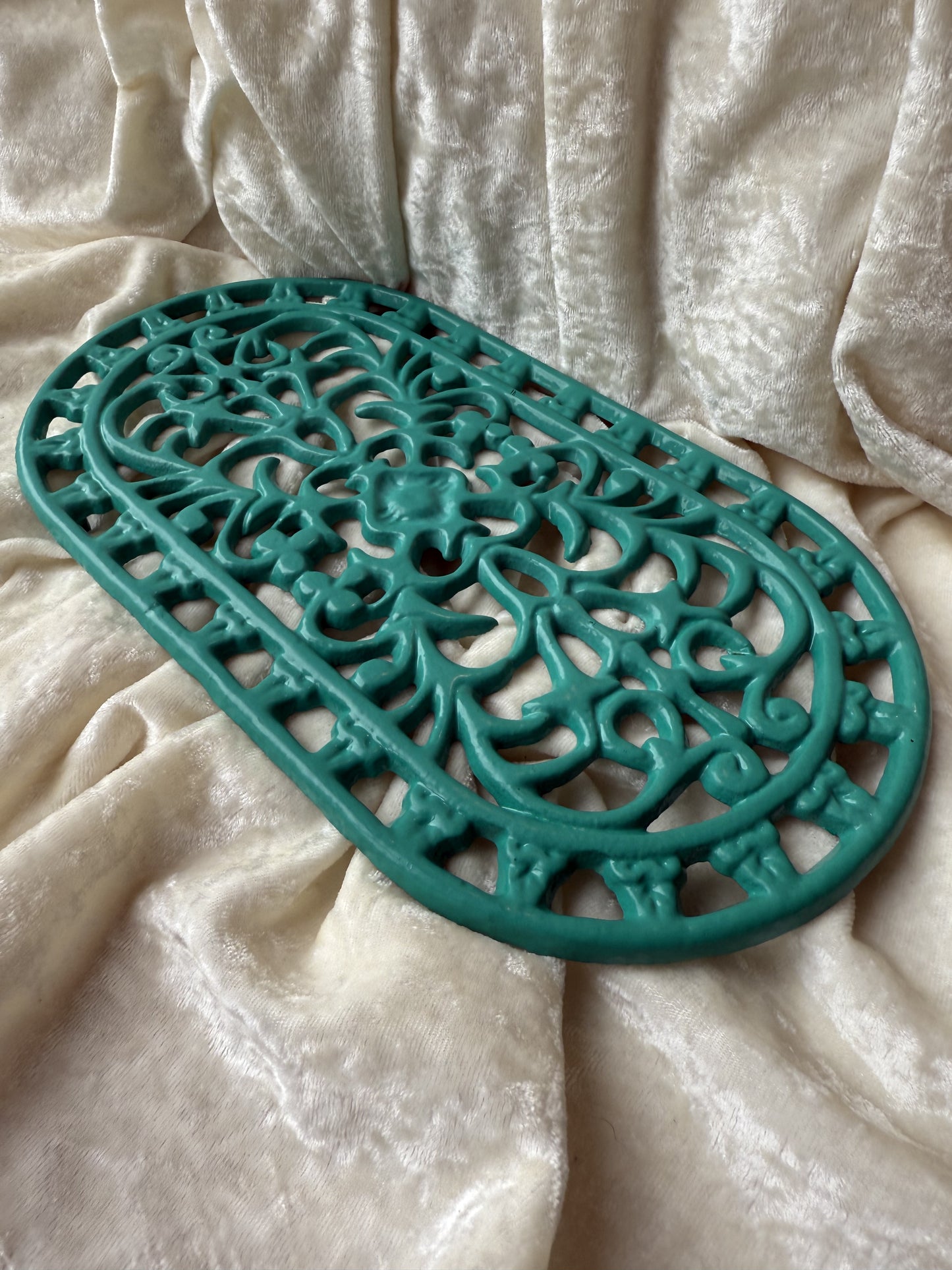 Dessous de plat turquoise en fonte