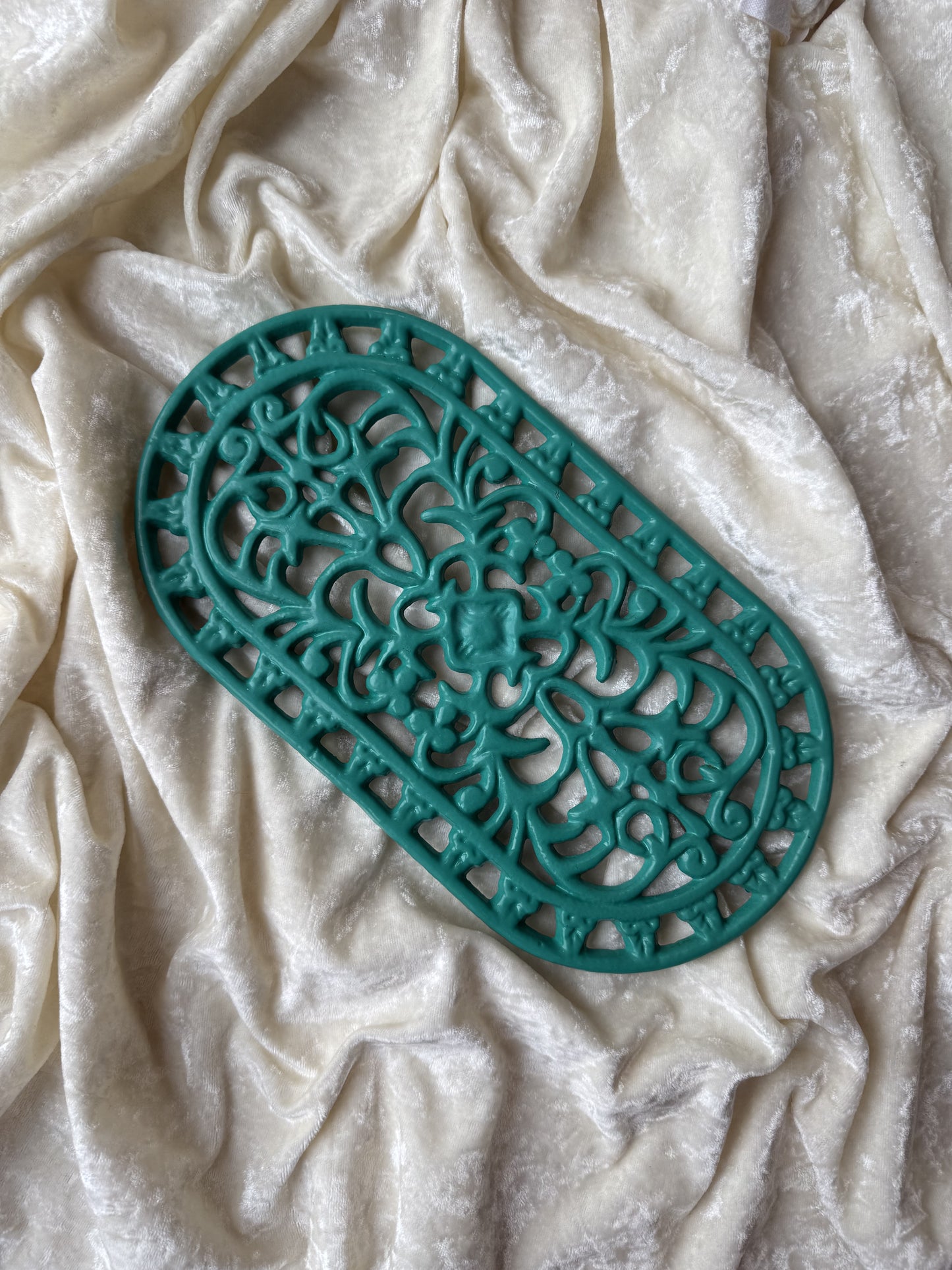 Dessous de plat turquoise en fonte