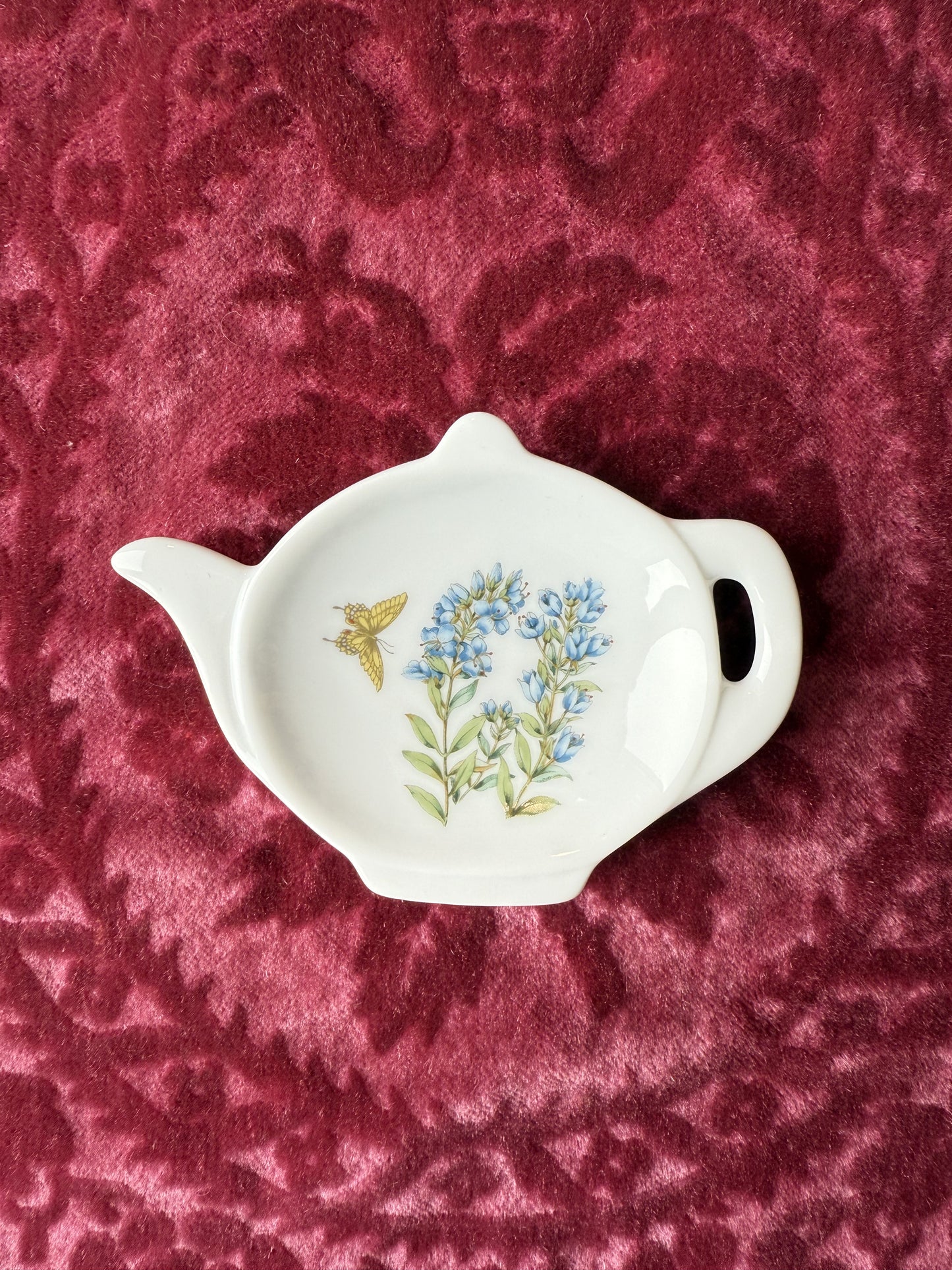 Repose sachet de thé en forme de théière