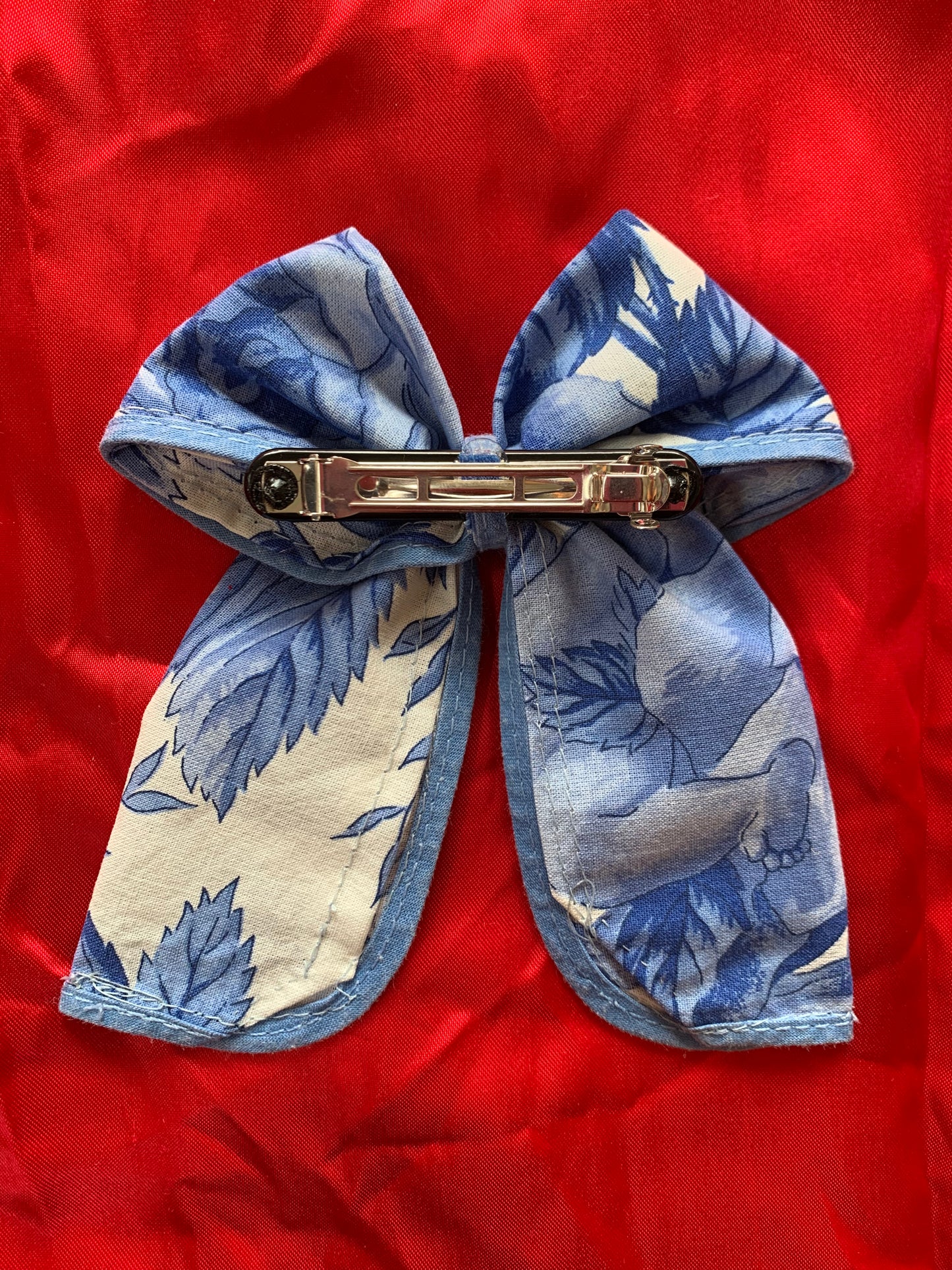 Noeud cheveux bleu & blanc motifs floraux