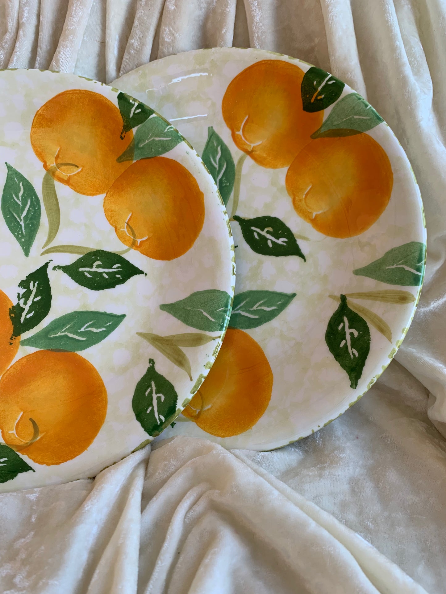Deux assiettes plates motifs oranges Made in Italy