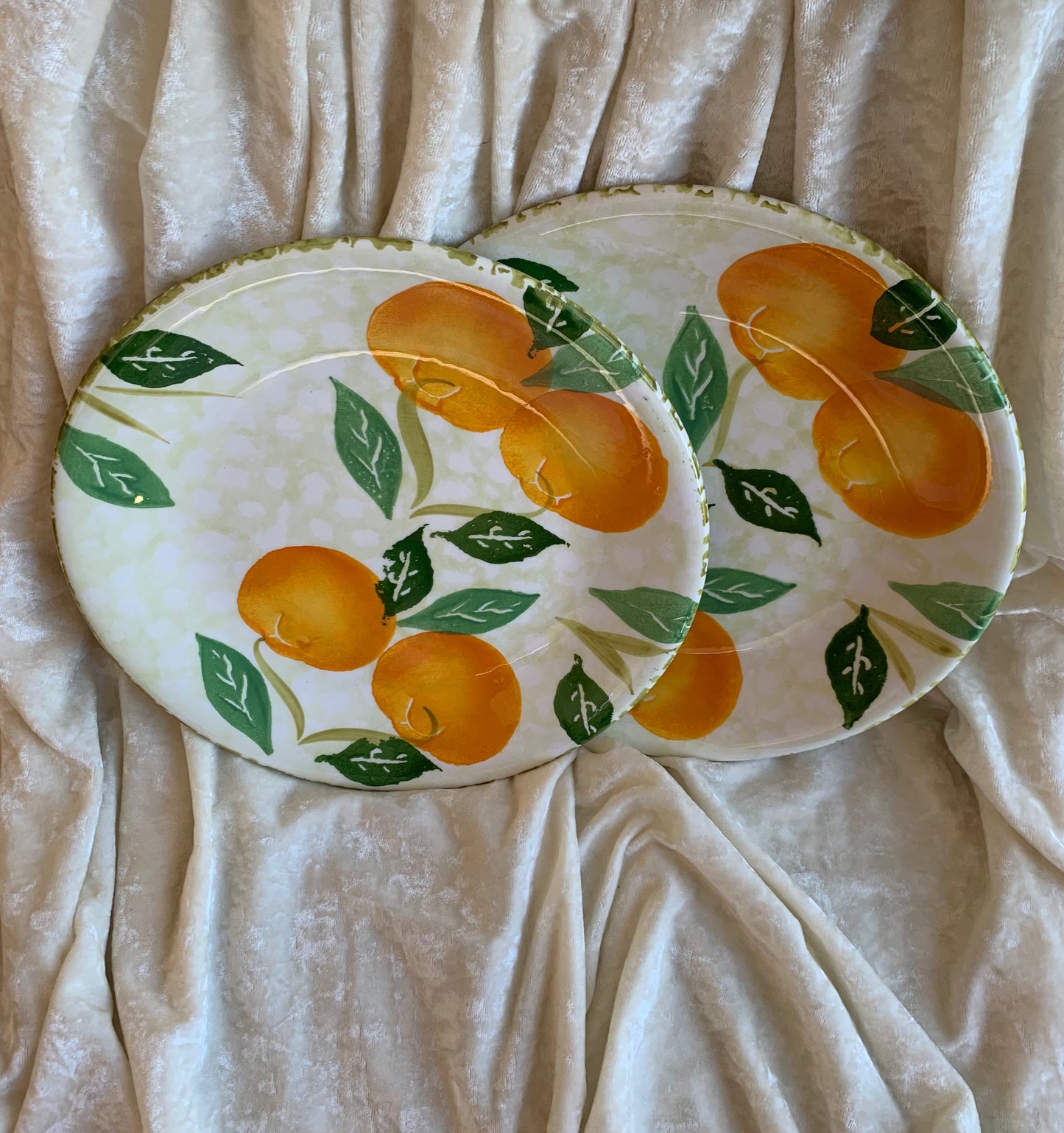 Deux assiettes plates motifs oranges Made in Italy