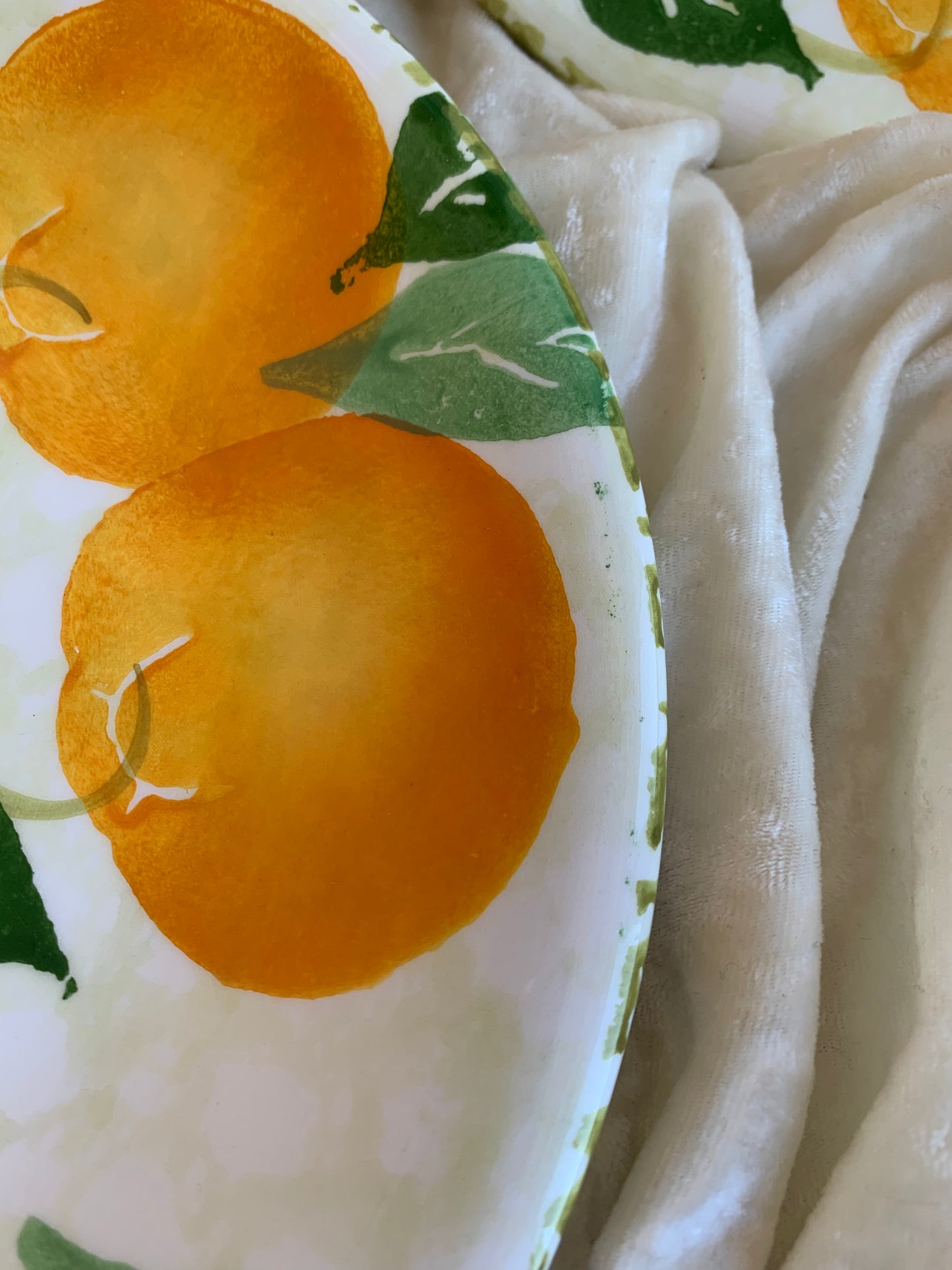 Deux assiettes plates motifs oranges Made in Italy