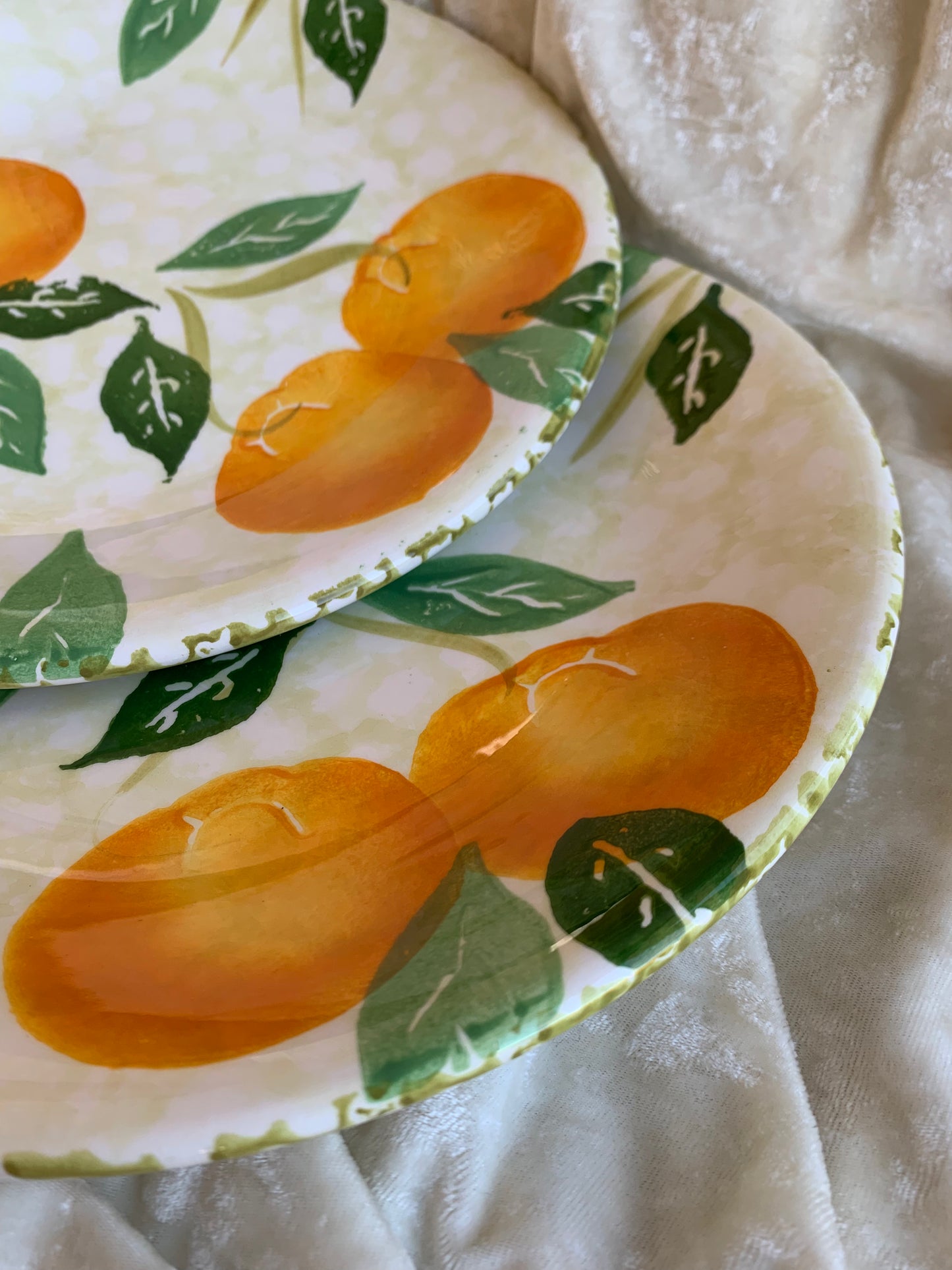 Deux assiettes plates motifs oranges Made in Italy