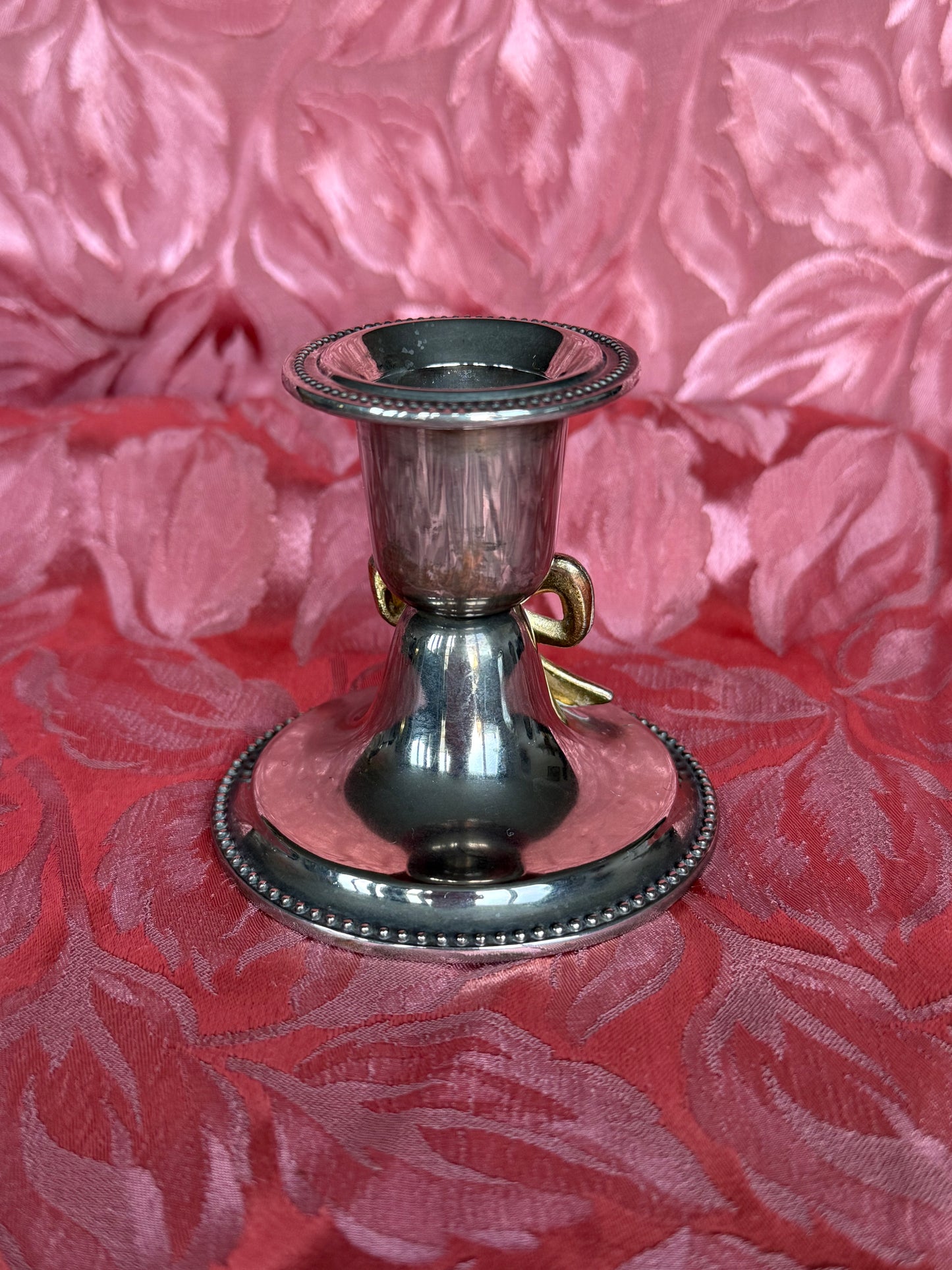Bougeoir vintage en métal argenté et noeud doré