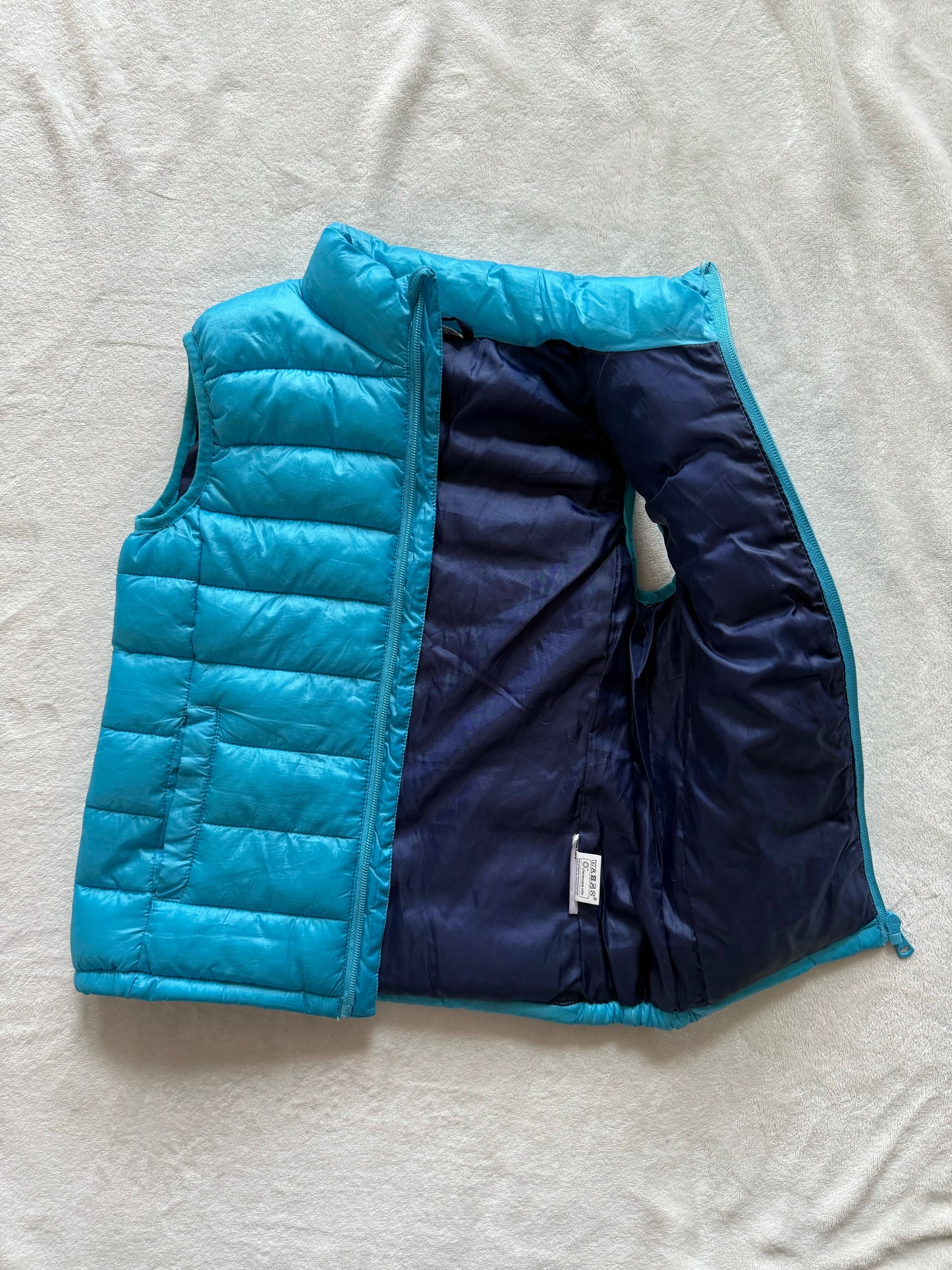 Doudoune bleue sans manches T.6-8 ans