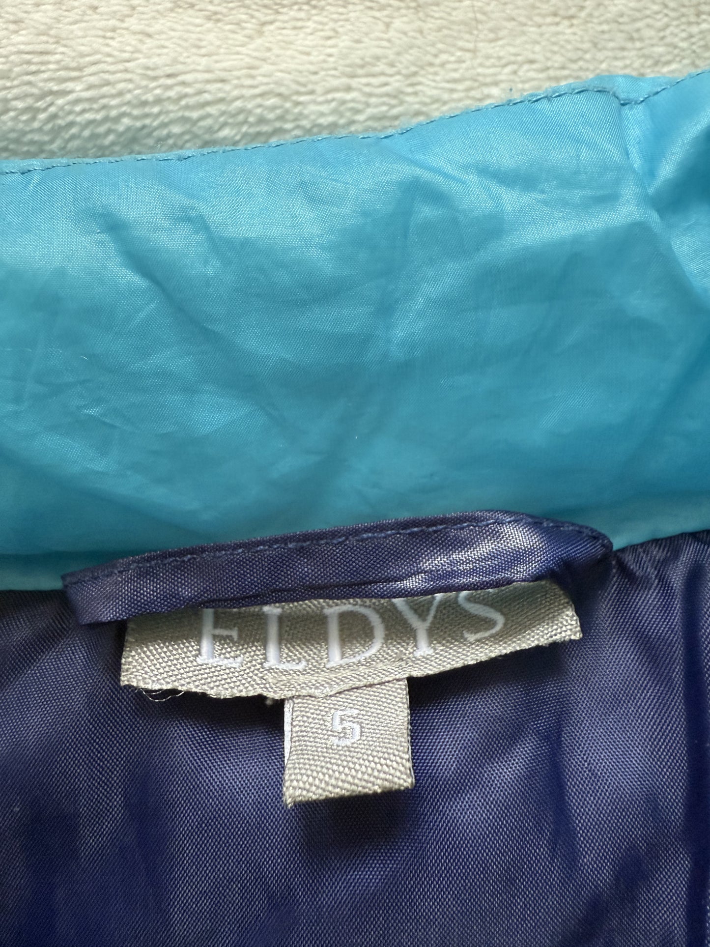 Doudoune bleue sans manches T.6-8 ans