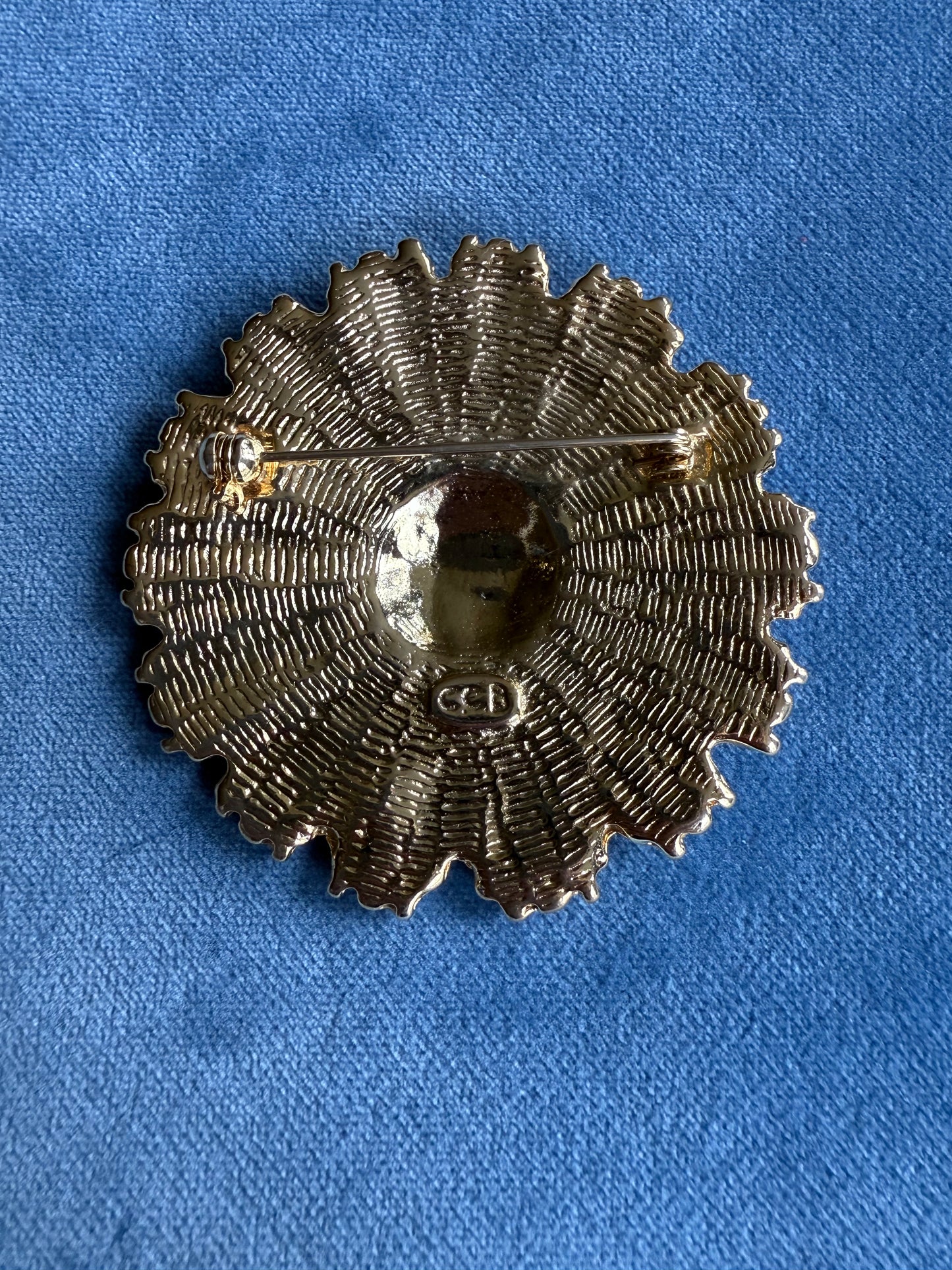 Broche ancienne en forme de soleil CCB