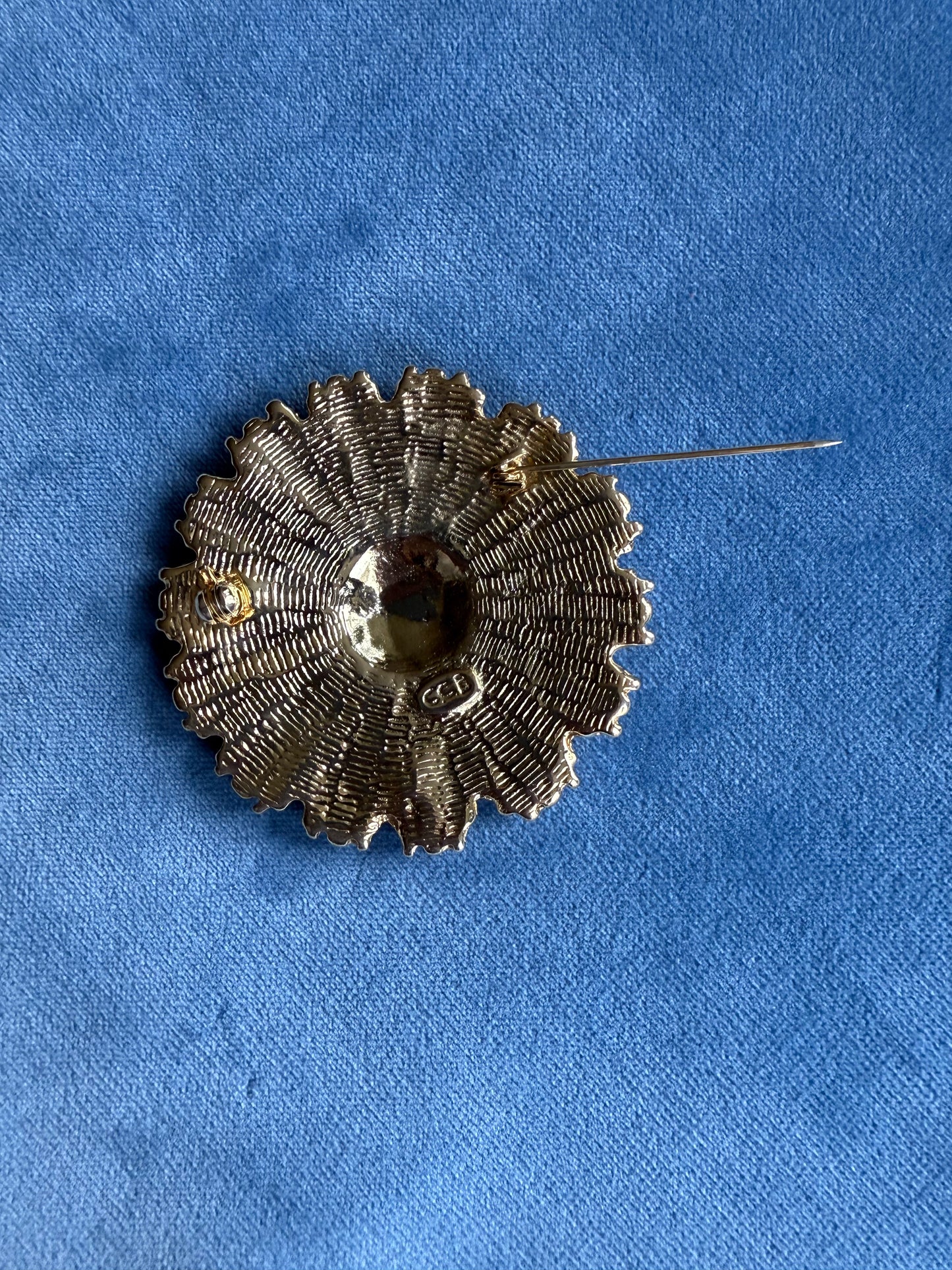 Broche ancienne en forme de soleil CCB